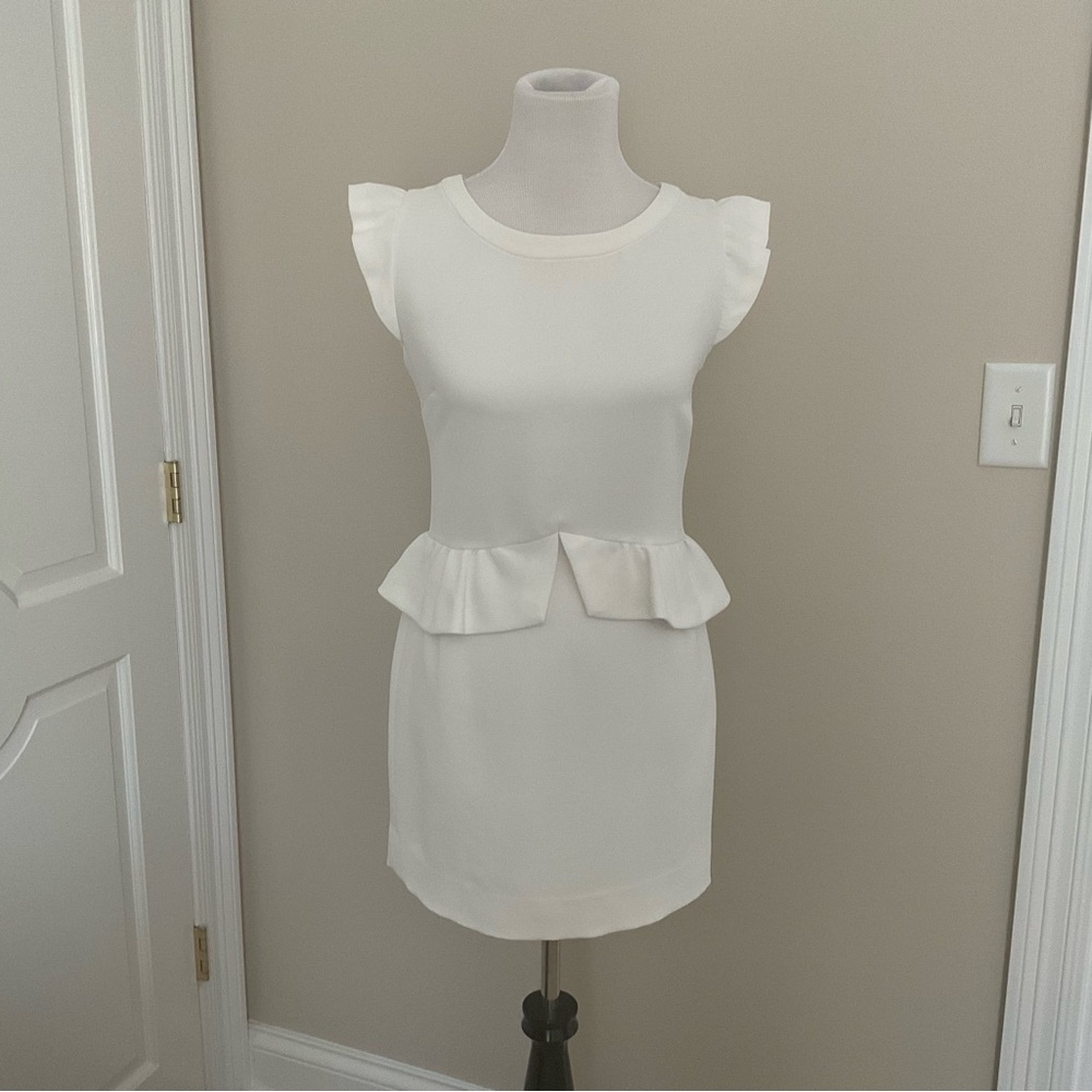 SANDRO WHITE PEPLUM DRESS IN SIZE 3 ( 6 US ) .